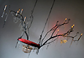 lustre balançoire allumant les ampoules par le mouvement, installation lumineuse interactive, Piet.sO